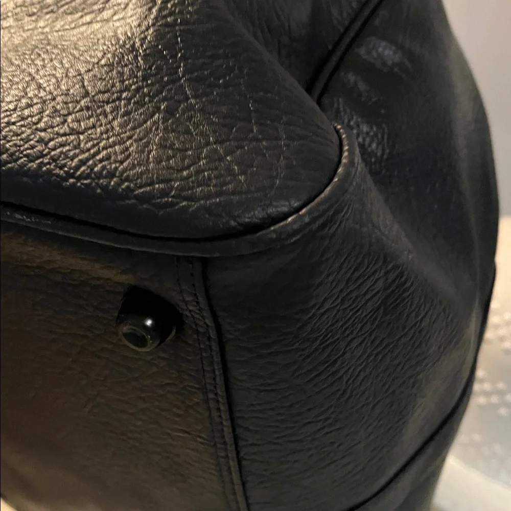 Burberrys Dark Navy Leather Bag with Embroidered Patch
